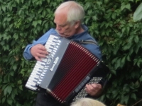August 2015 garden party - Chris on accordian
